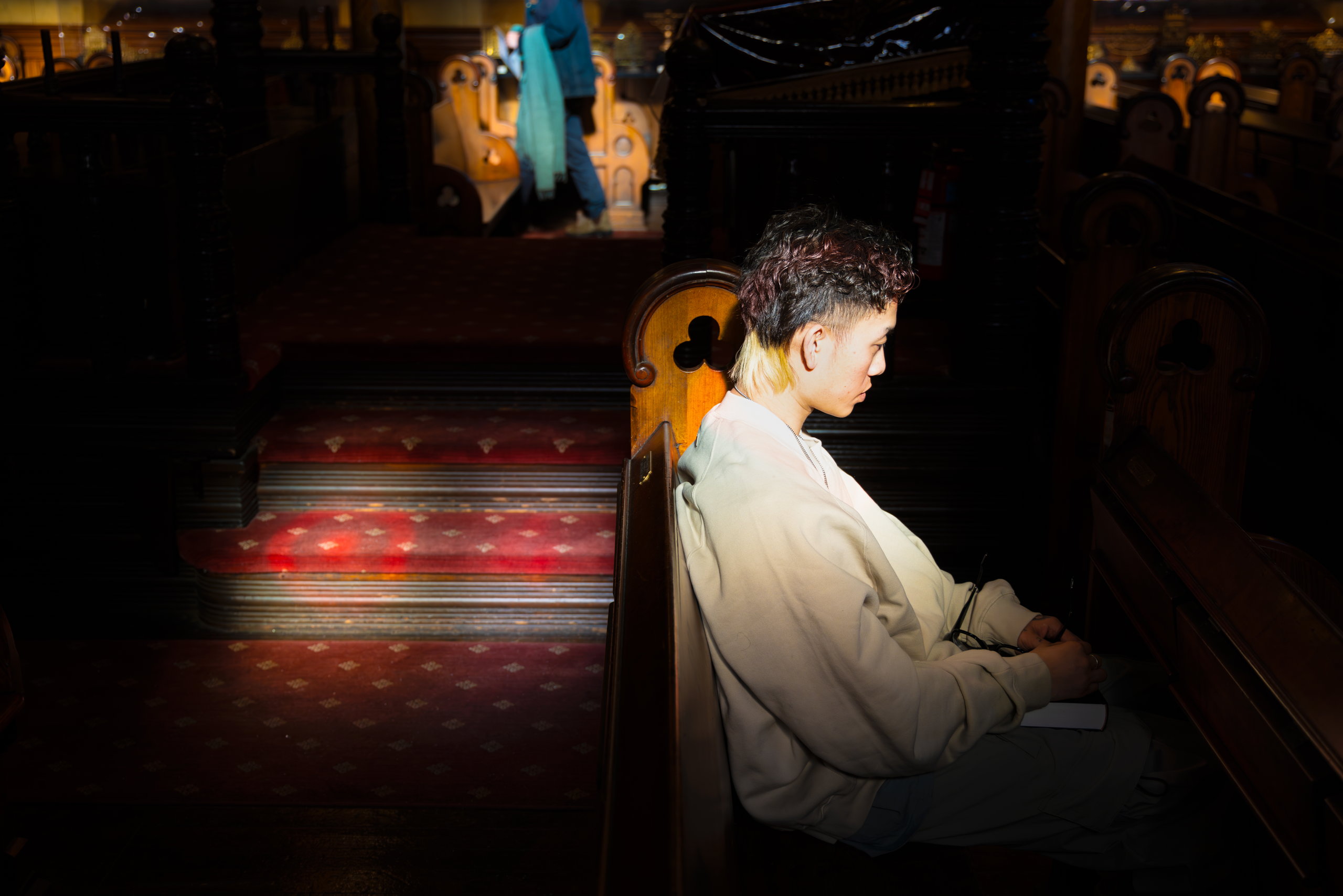A man playing piano in a dark interior — Win or Lose
